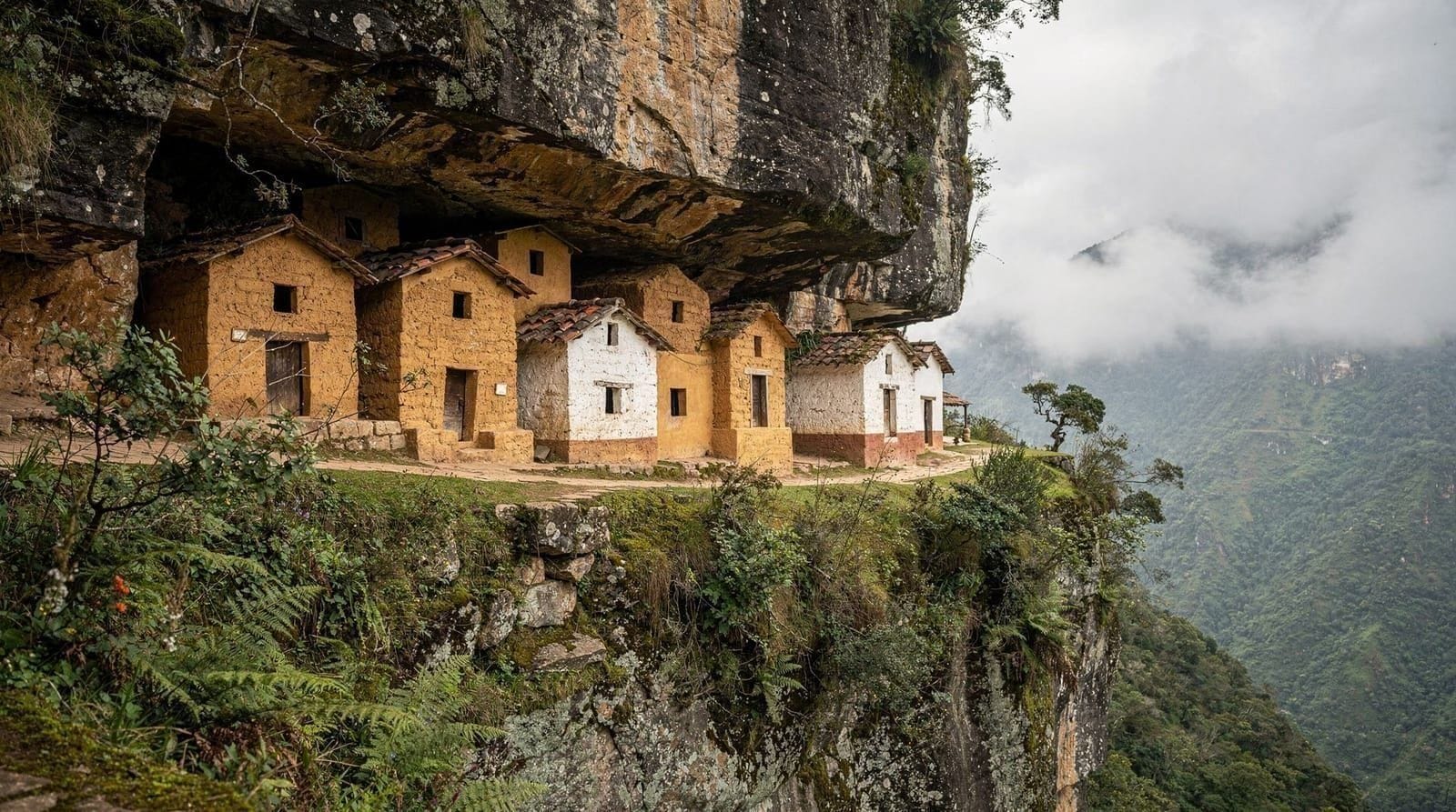 Revash mausoleums guide — Visit the Revash mausoleums, ochre house-shaped Chachapoya tombs set into a clif