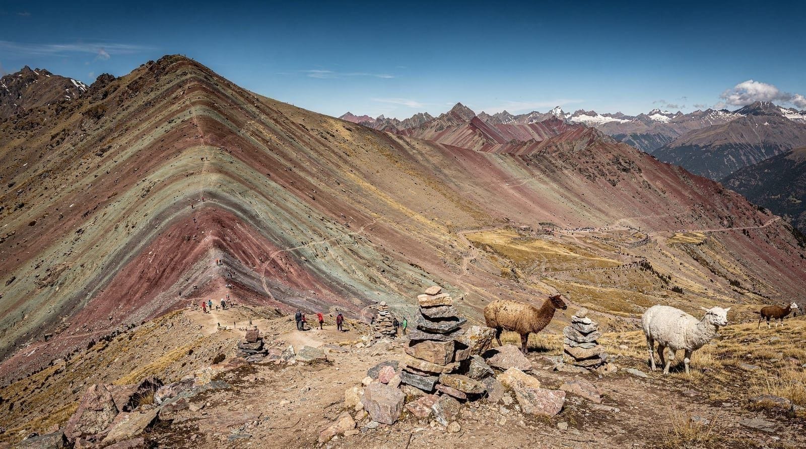 Vinicunca vs Palccoyo: which rainbow mountain to choose? — Vinicunca or Palccoyo? Compare the two Cusco rainbow mountains on altitude, crow